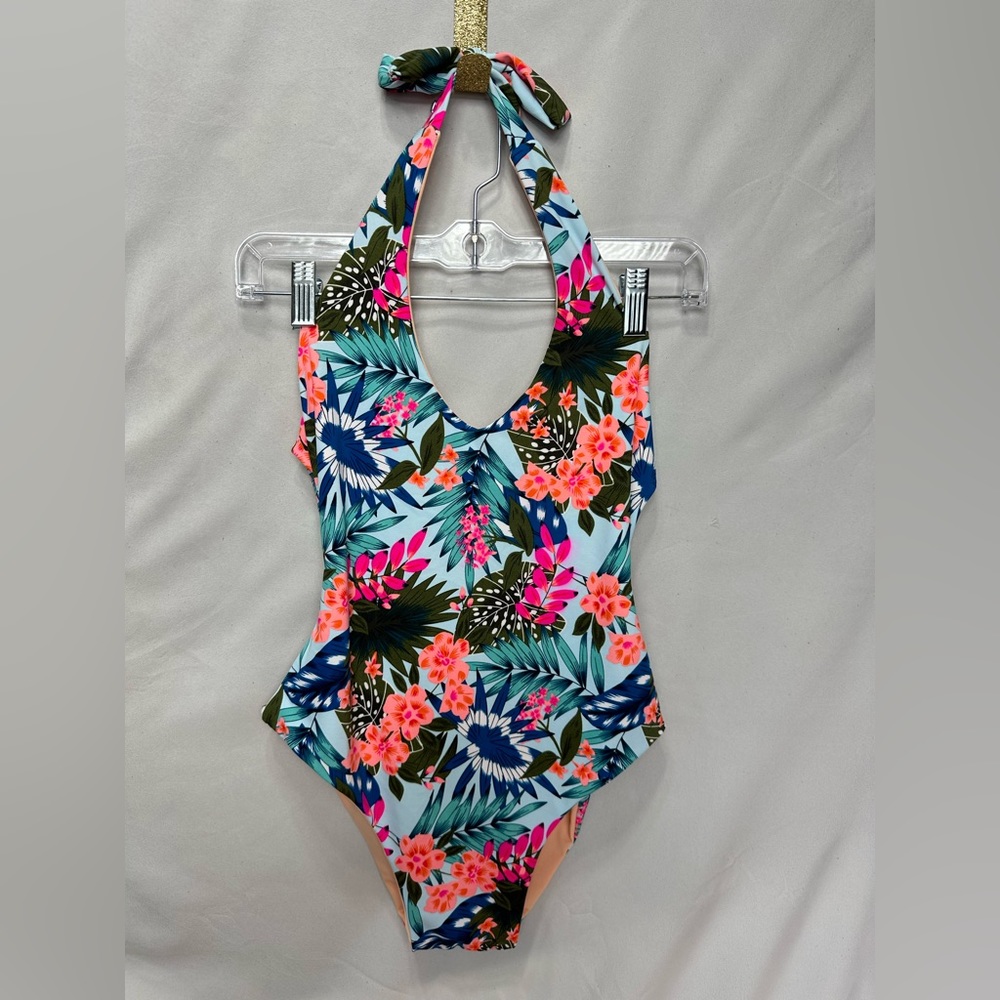 Fully reversible one piece swim or bodysuit